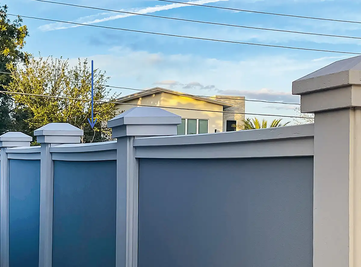 white stucco wall fence